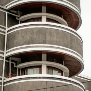 Close-up of a modern building with circular balconies showcasing contemporary architecture