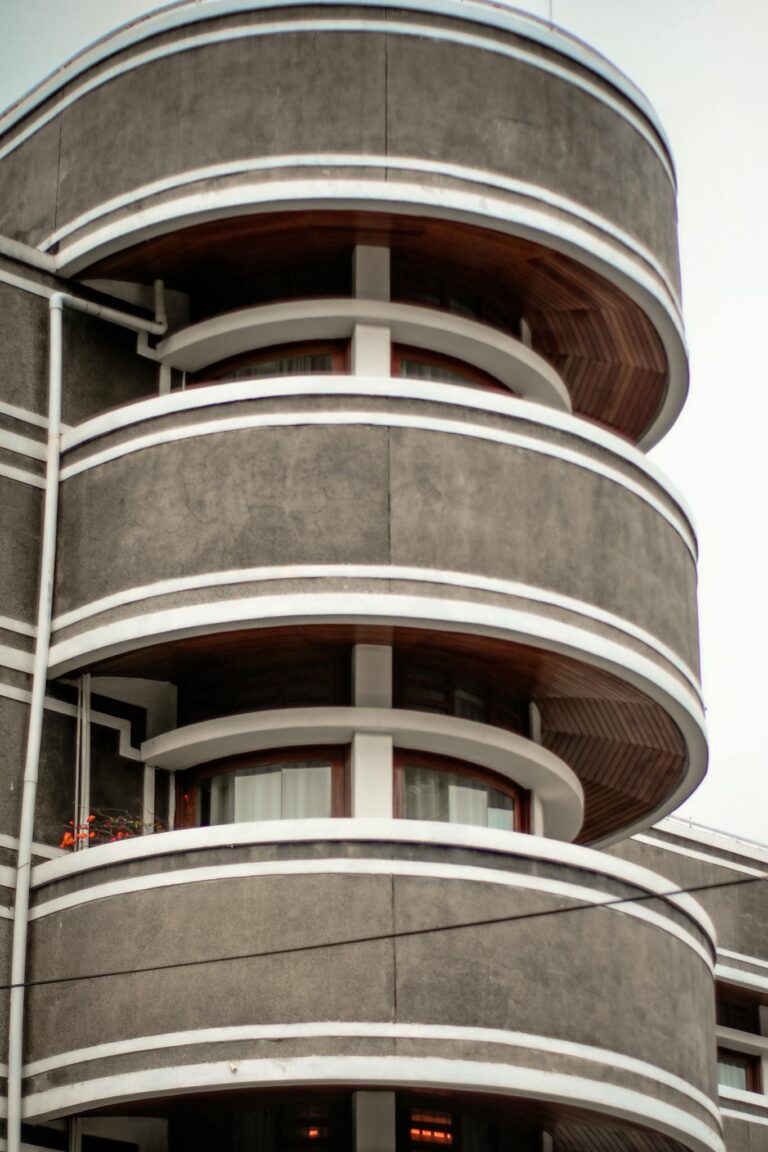 Close-up of a modern building with circular balconies showcasing contemporary architecture